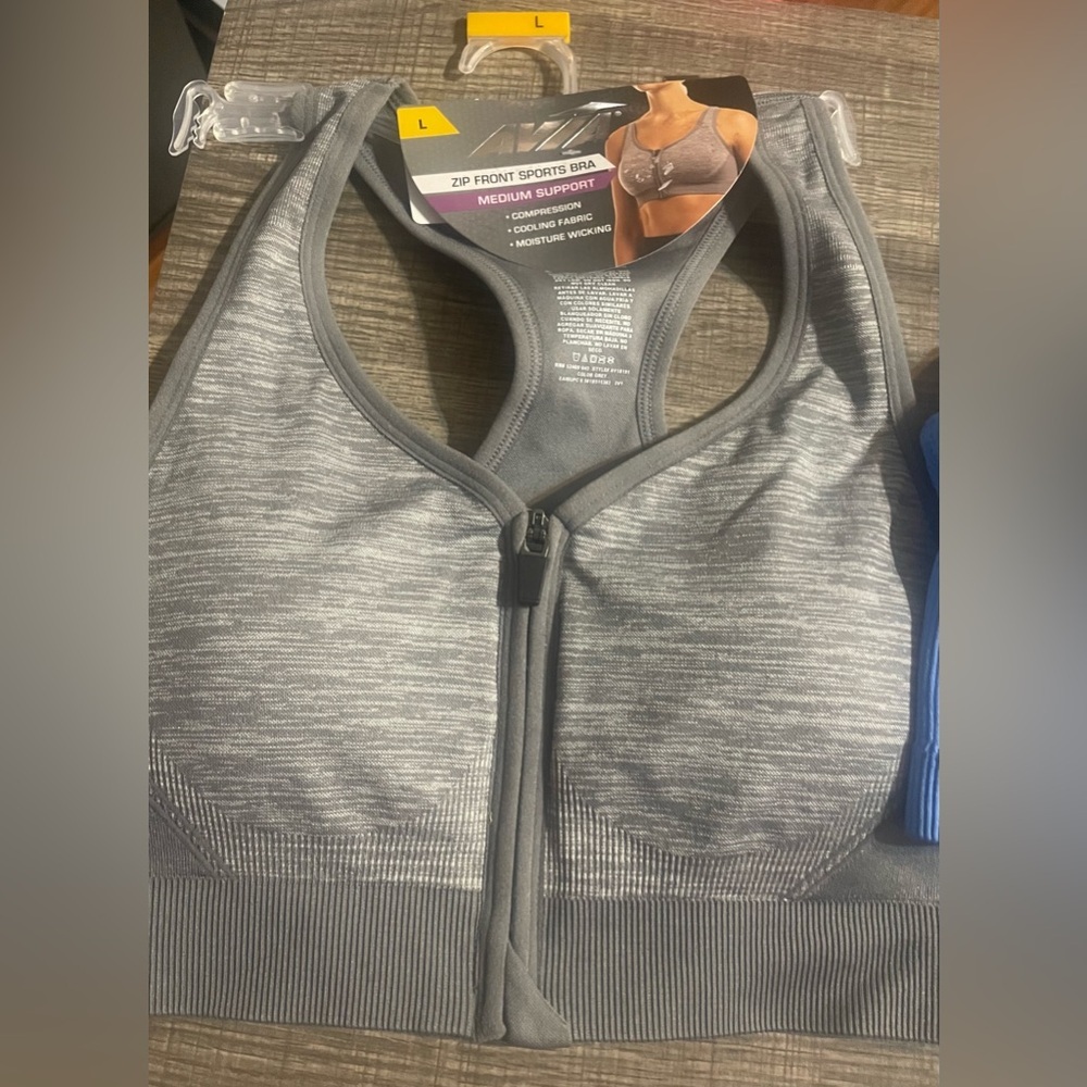 A set of two bras, size large. NWT!